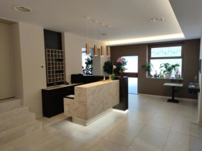 Отель Hotel Emiliana  Вилладоссола